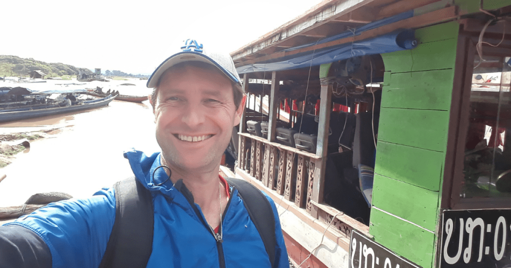 Mark taking the slow boat from Thailand to Luang Prabang