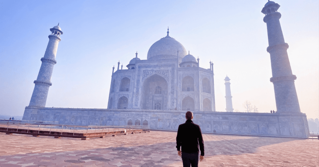 taj mahal in sunshine, lonely man in shot